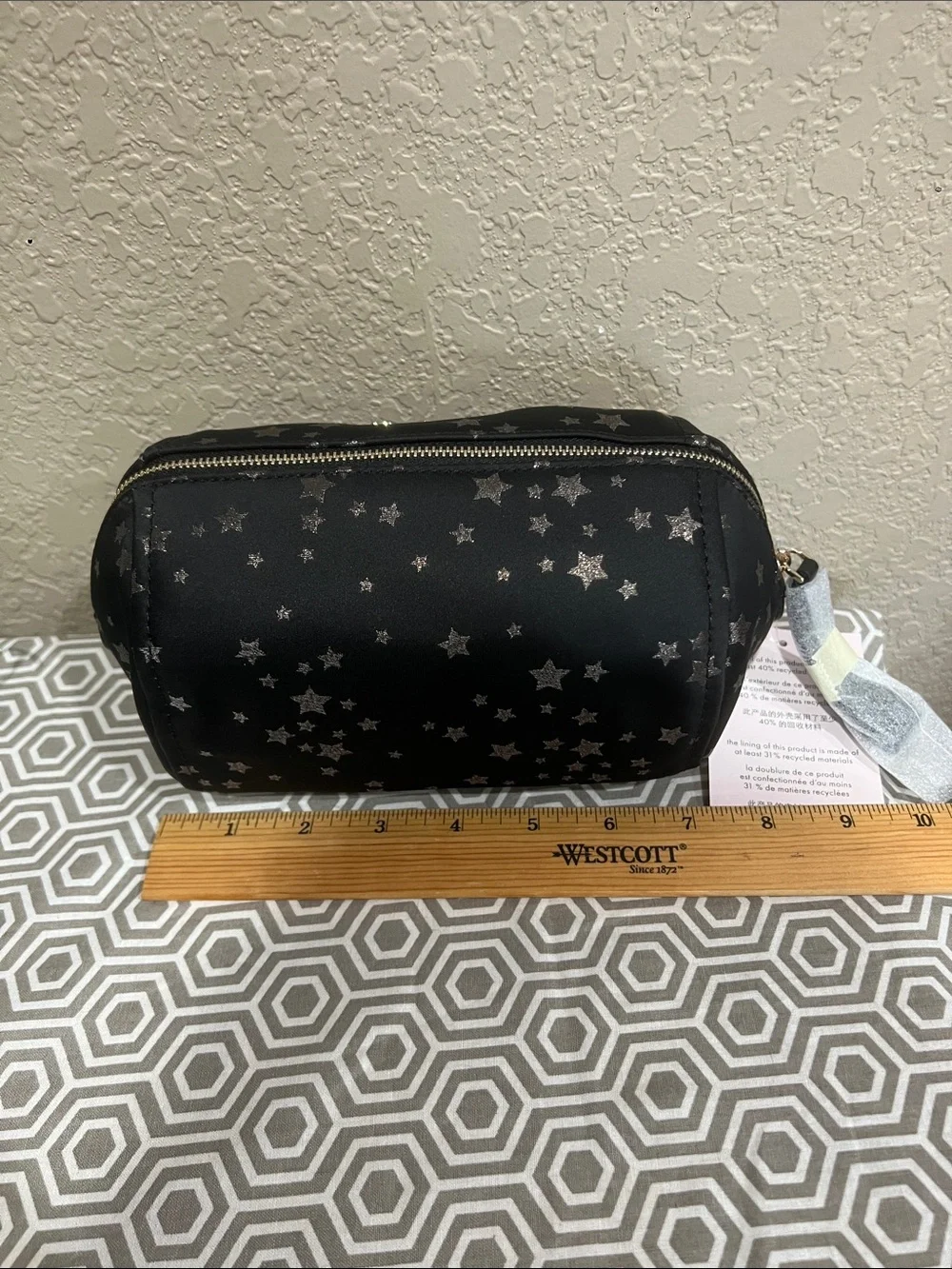 kate spade black cosmetic pouch with silver star print